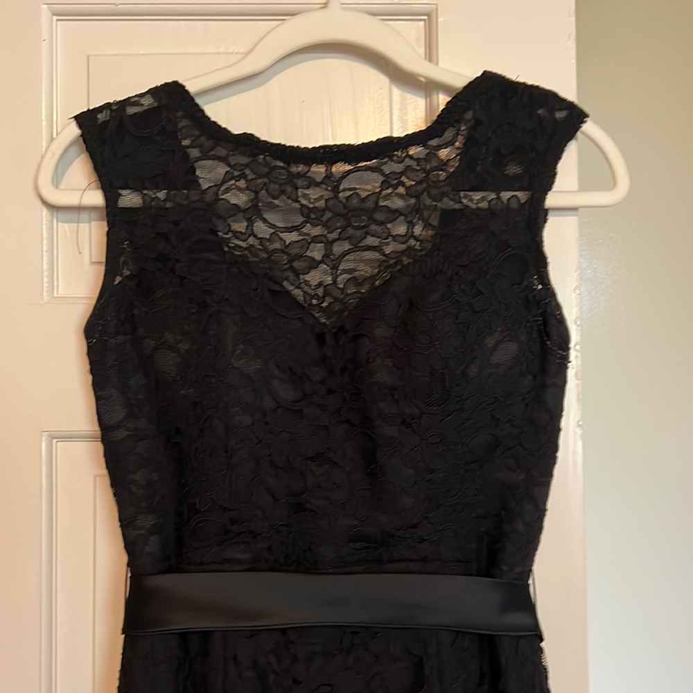 Don’t just wear a gown. Wear something magical. Black Chantilly lace!
